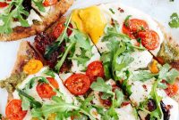 Garlic Pesto Flatbread Pizza with Tomatoes and Arugula