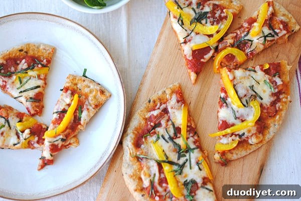 Whole-Wheat Pita Pizza Recipe 3 Slices of pita pizza with fresh basil