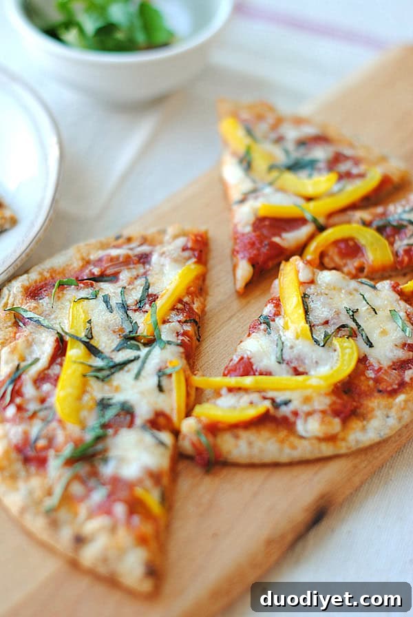 Whole-Wheat Pita Pizza Recipe 4 Close-up of melted mozzarella and peppers