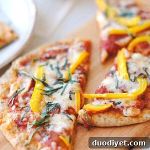 Whole-Wheat Pita Pizza Recipe 5 Finished pita pizzas with basil