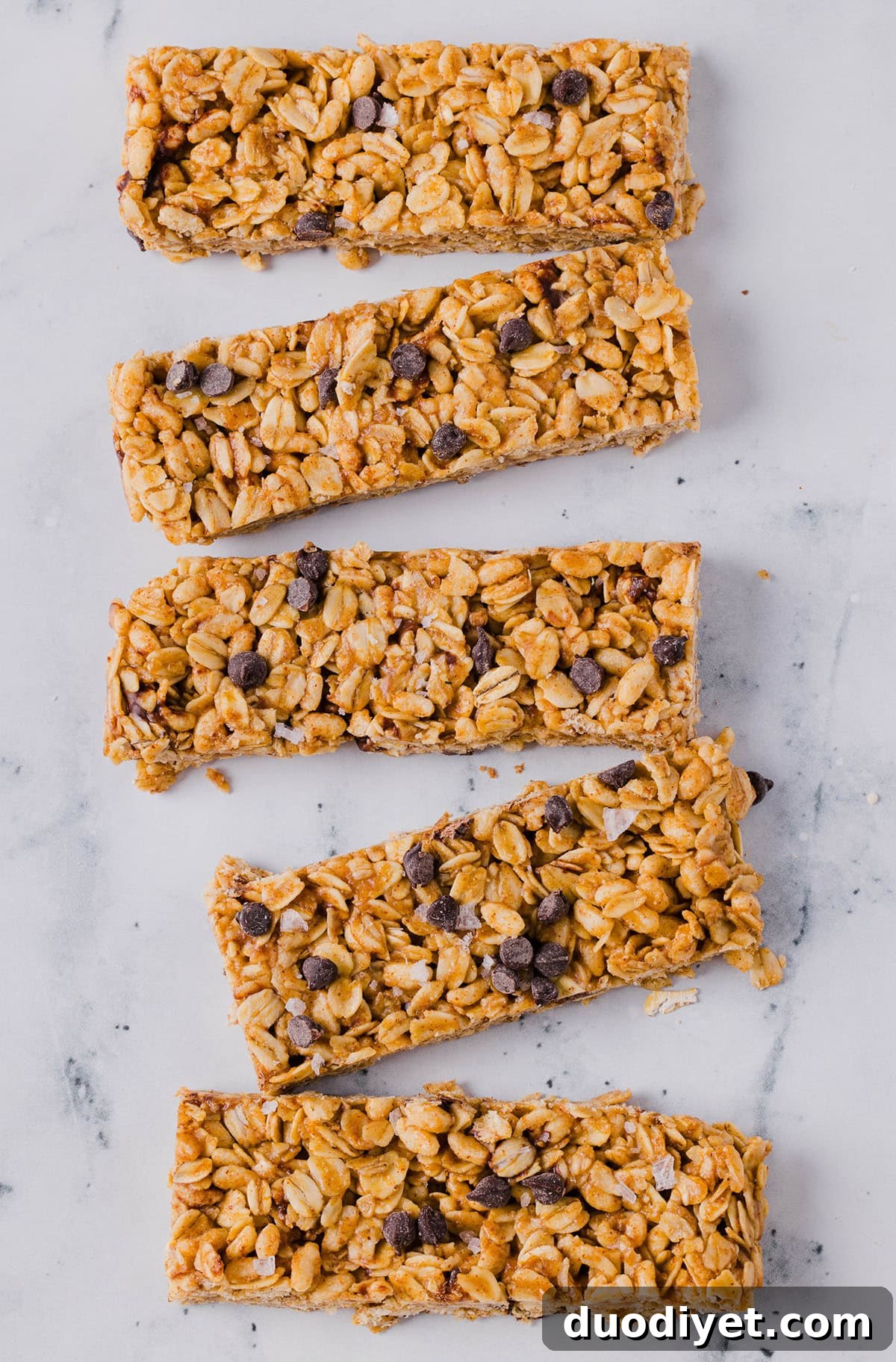 These No Bake Almond Butter Granola Bars are a wholesome, delicious snack that easily comes together in just 15 minutes using simple pantry ingredients! Perfect for busy mornings, a healthy snack or for your kid's lunchbox!