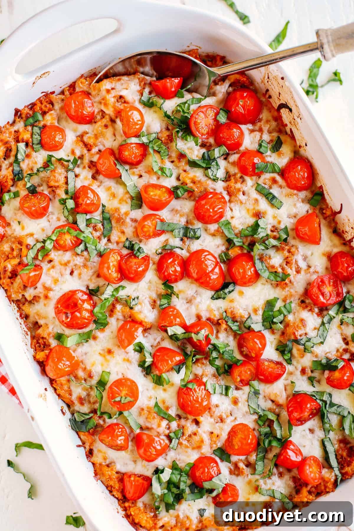 Caprese Chicken and Quinoa Bake Recipe 2 This super flavorful Cheesy Caprese Chicken and Quinoa Casserole is the perfect weeknight meal that is hearty, full of flavor and sure to please the entire family!