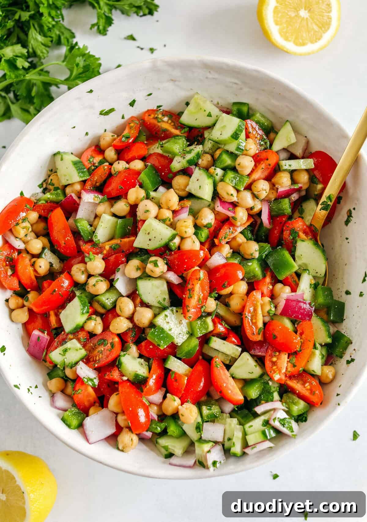 Mediterranean Tomato, Cucumber and Chickpea Salad 3 This Tomato, Cucumber and Chickpea Salad is a delicious summer staple made with fresh tomatoes, crisp cucumbers, chickpeas, red onion, and green bell pepper all tossed with a bright lemon vinaigrette! Easy, healthy and the perfect side dish with grilled chicken, fish or steak!
