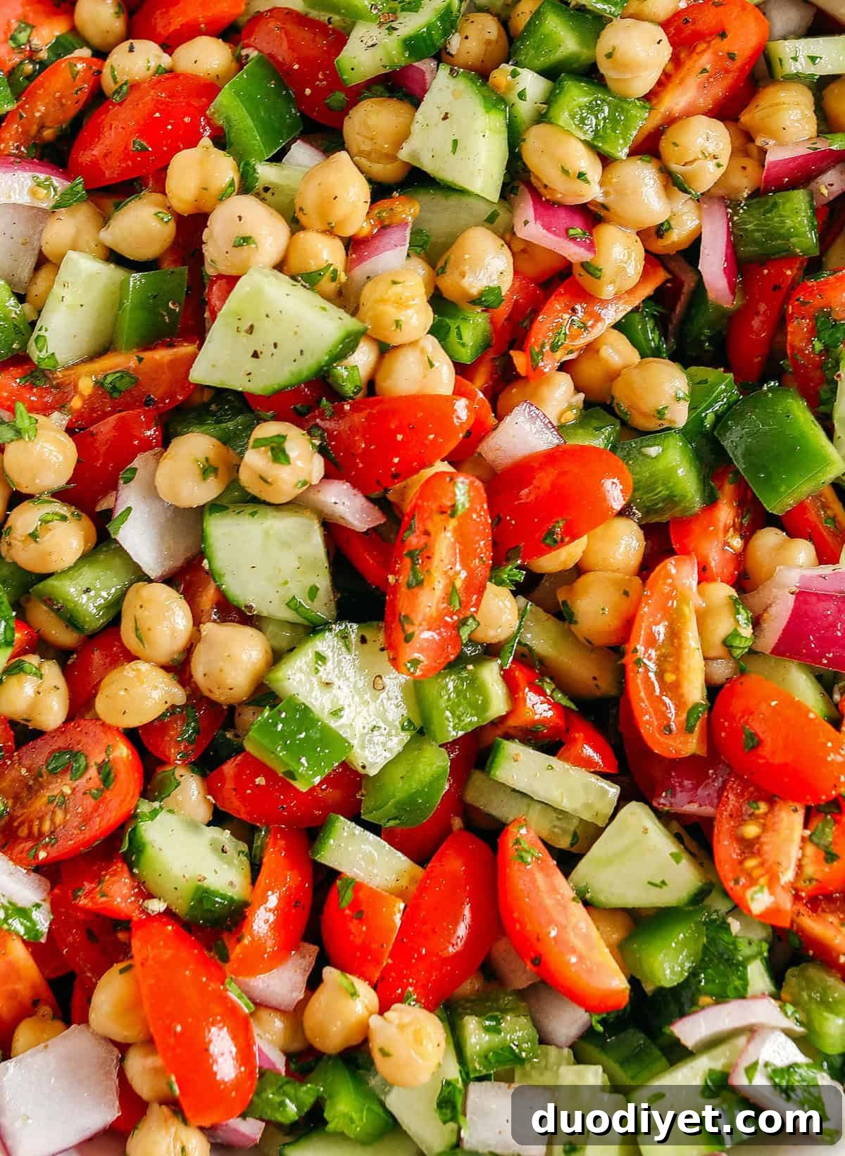 Mediterranean Tomato, Cucumber and Chickpea Salad 4 Serving bowl of tomato, cucumber and chickpea salad