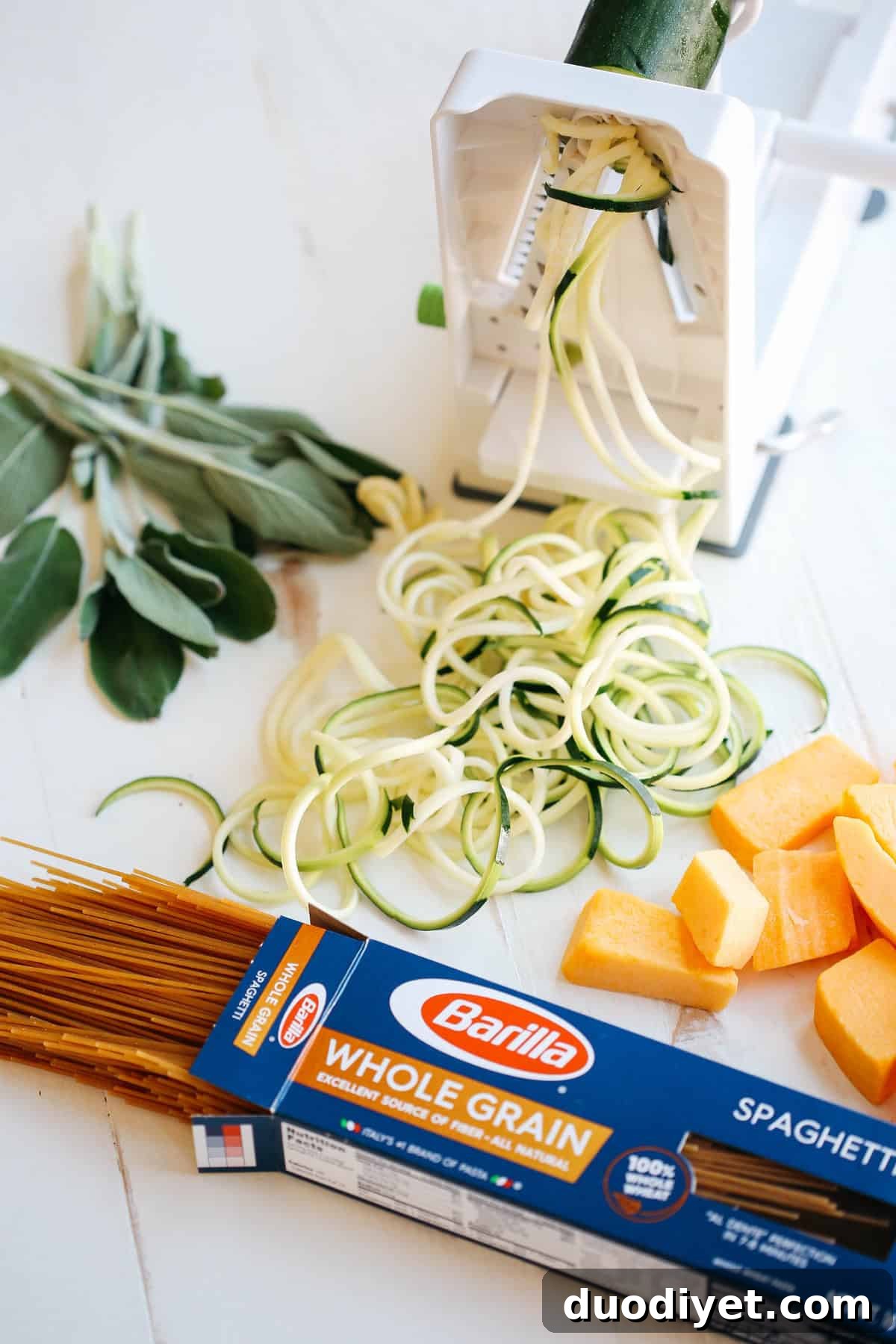 This Butternut Squash & Sage Spaghetti with Zucchini Noodles that is vegan, dairy-free and can easily be made in just 30 minutes using a few simple healthy ingredients!