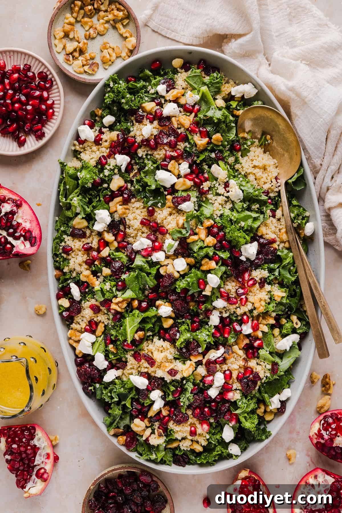 Winter Kale and Quinoa Salad Recipe 2 Winter Kale and Quinoa Salad with kale, quinoa, pomegranate seeds and walnuts