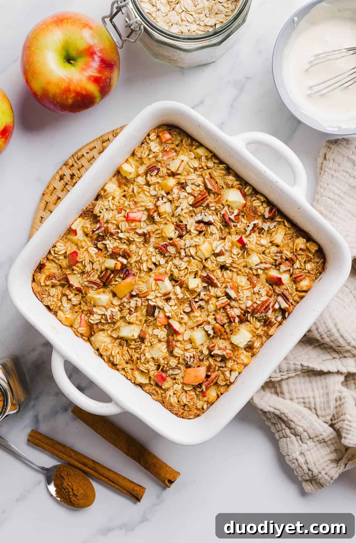 Apple Cinnamon Baked Oatmeal Recipe for Cozy Mornings 4 Baked apple oatmeal in a baking dish