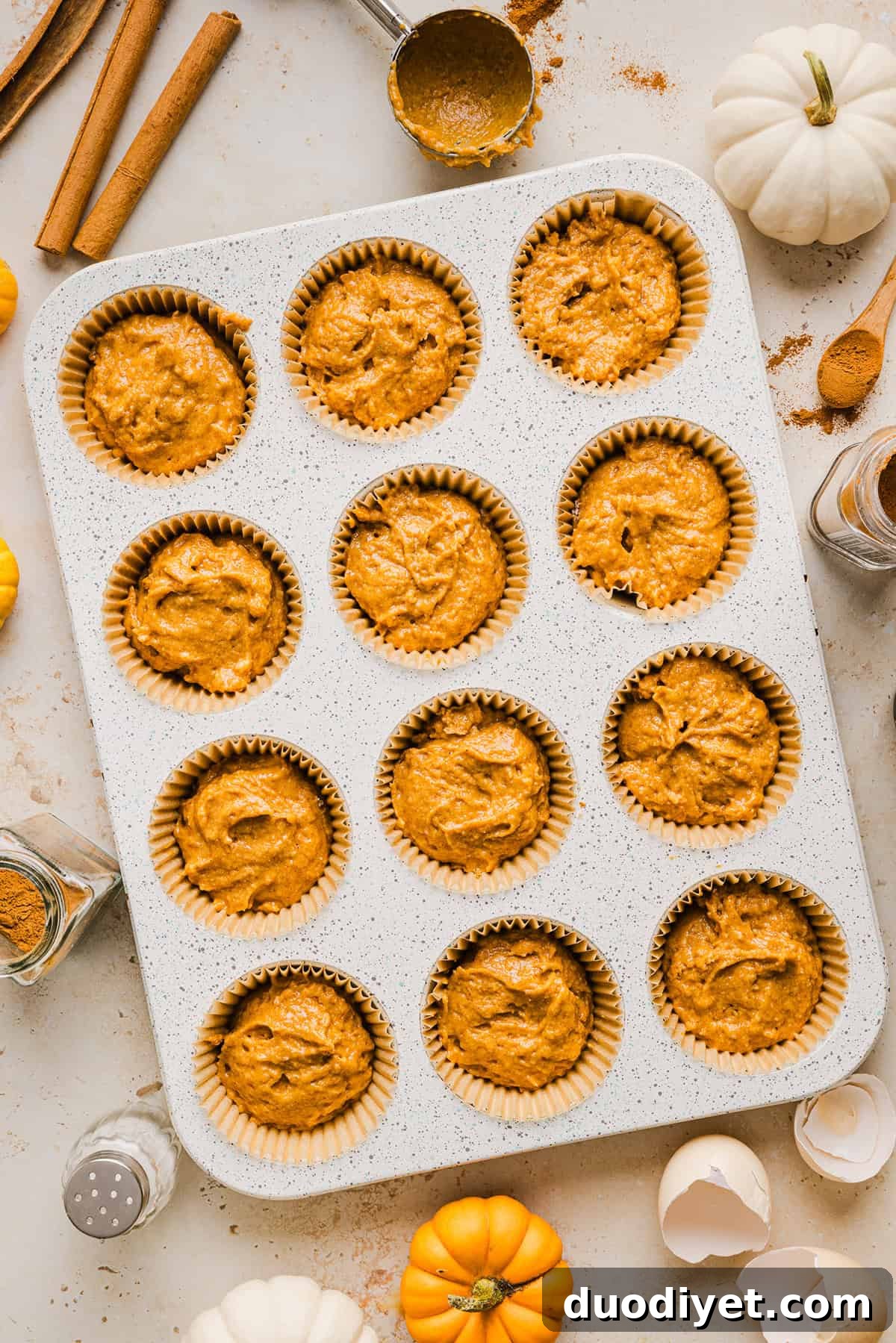 Moist Whole Wheat Pumpkin Muffins with Warm Spices 4 These Whole Wheat Pumpkin Muffins are moist, fluffy, and made healthier with whole wheat flour, applesauce, and zero butter or refined sugar. Loaded with delicious pumpkin flavor and warm spices for the perfect fall muffin!