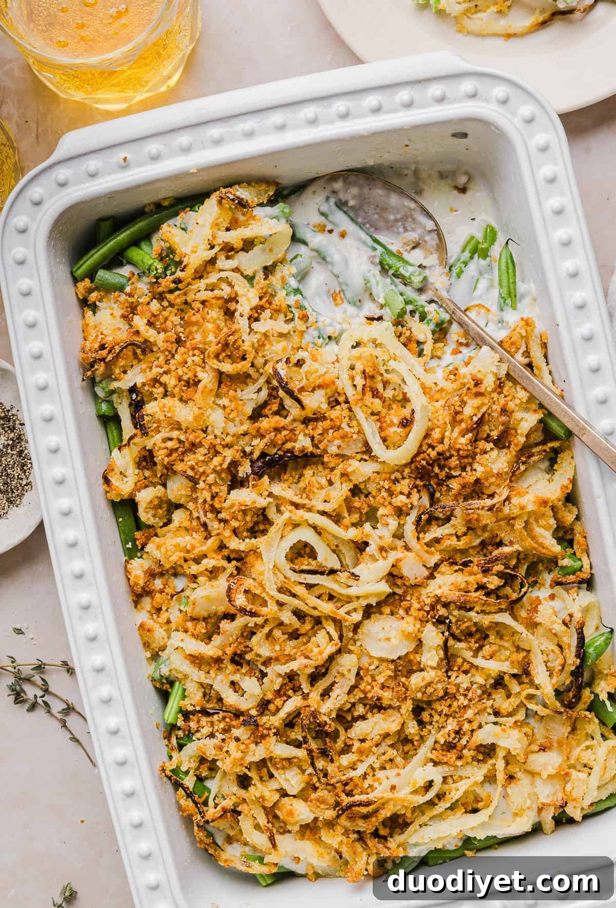 Lightened Green Bean Casserole Recipe for Holiday Sides 2 This Healthy Green Bean Casserole has all the flavor you love about the classic recipe, but made with wholesome, real ingredients. Tender green beans tossed in a homemade mushroom cream sauce and topped with crispy onions for the perfect holiday side dish!