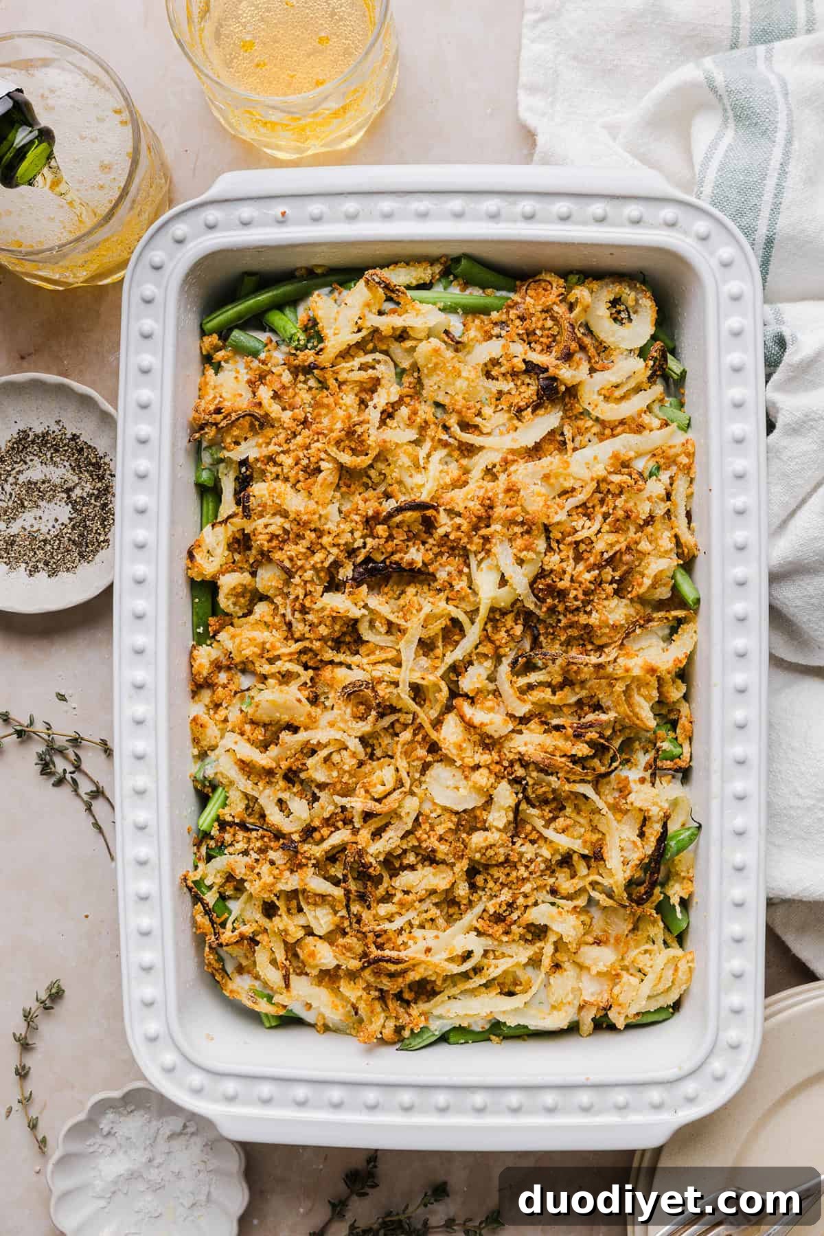 Lightened Green Bean Casserole Recipe for Holiday Sides 6 This Healthy Green Bean Casserole has all the flavor you love about the classic recipe, but made with wholesome, real ingredients. Tender green beans tossed in a homemade mushroom cream sauce and topped with crispy onions for the perfect holiday side dish!