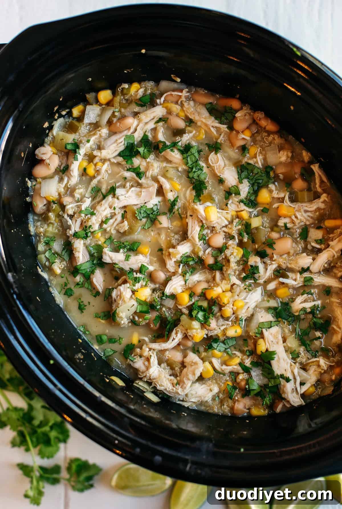 Slow Cooker White Chicken and Quinoa Chili ingredients and bowl