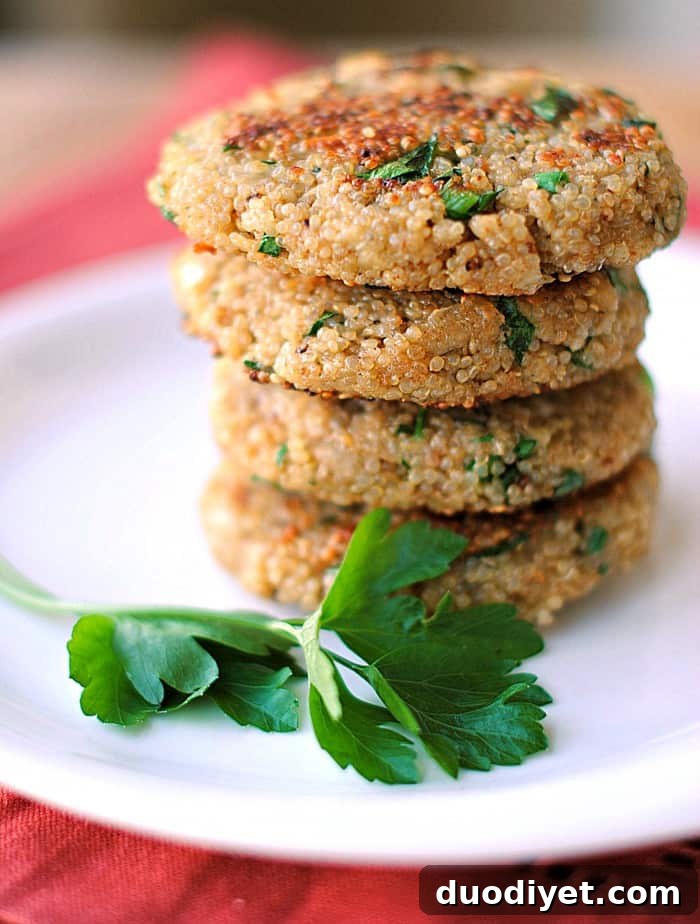 Crispy Spring Herb Quinoa Patties 2 Quinoa patties on plate