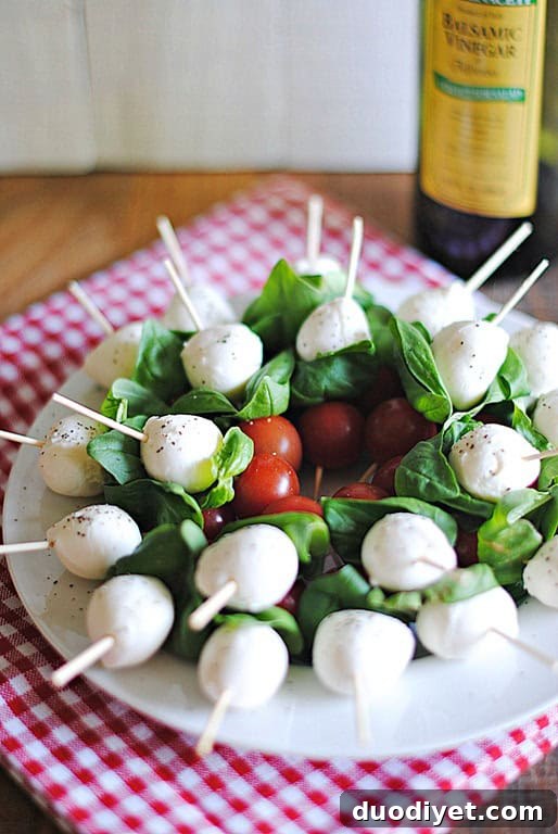 Caprese skewers on a platter