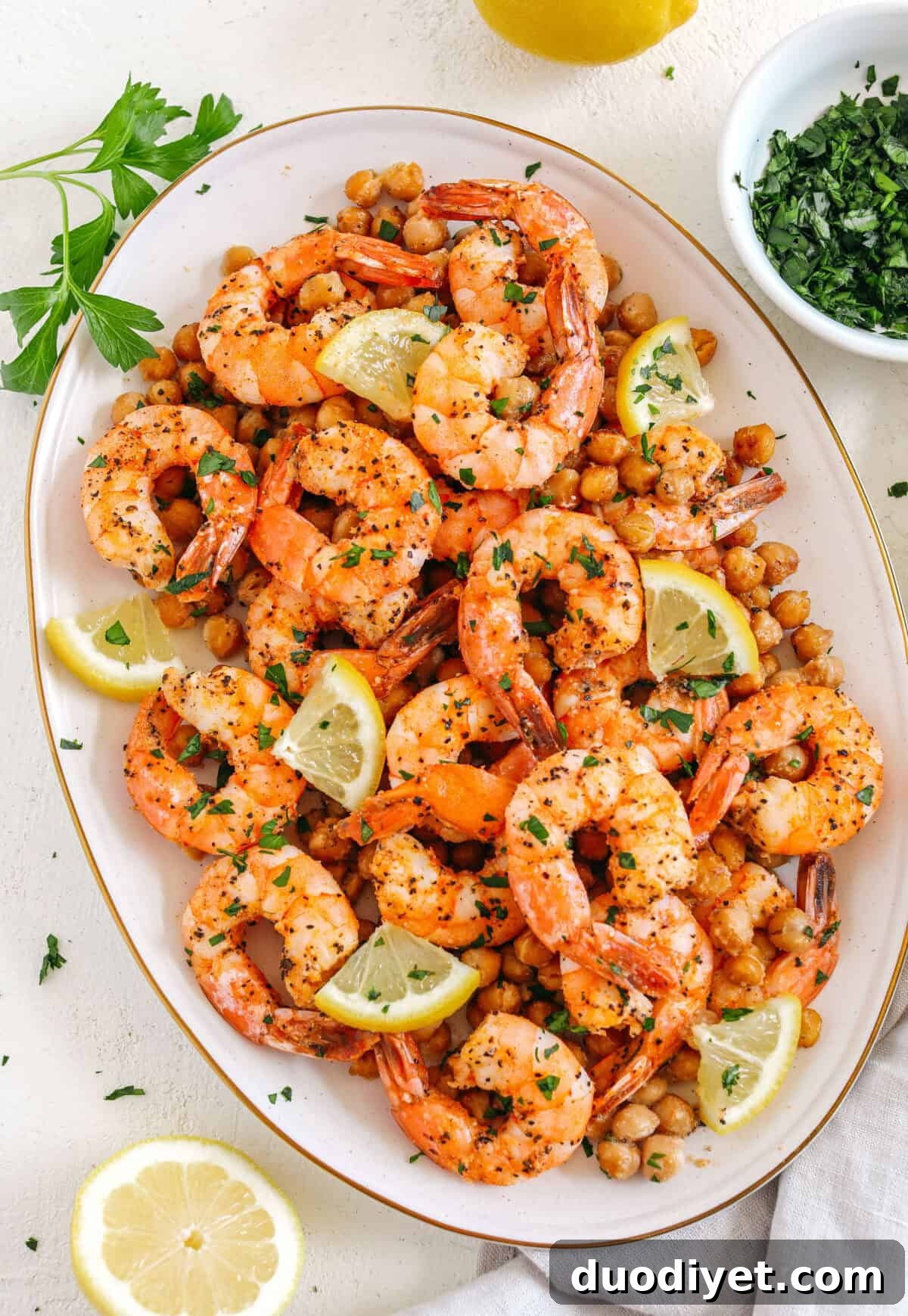 Skillet Lemon Garlic Shrimp with Chickpeas 3 Flavorful Lemon Garlic Shrimp with Chickpeas easily made in under 30 minutes all on one pan with just a few simple ingredients! Perfect as an appetizer, on top of a salad or even as a main dish!