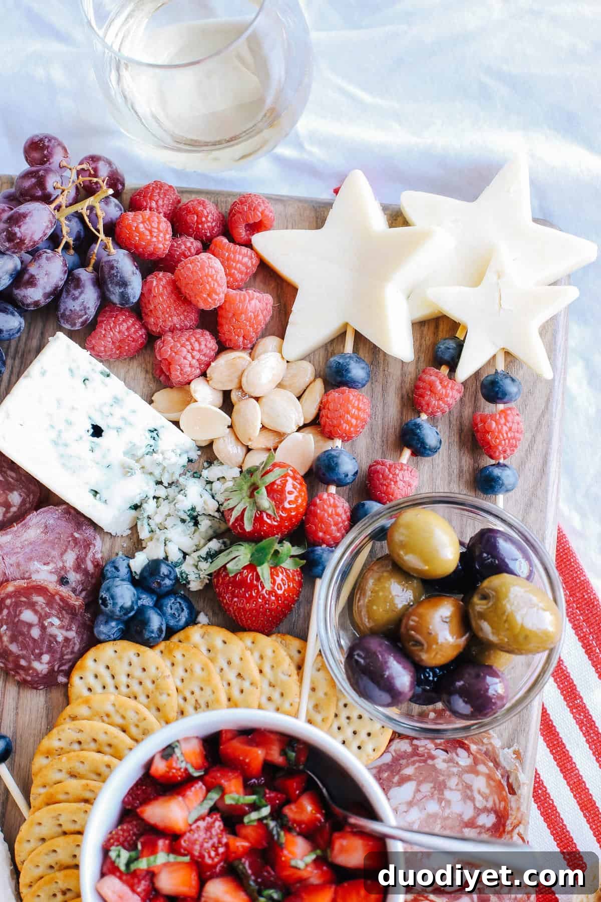 Red, White and Blue Cheese Board for 4th of July 5 A spread of cheeses, charcuterie and patriotic fruit