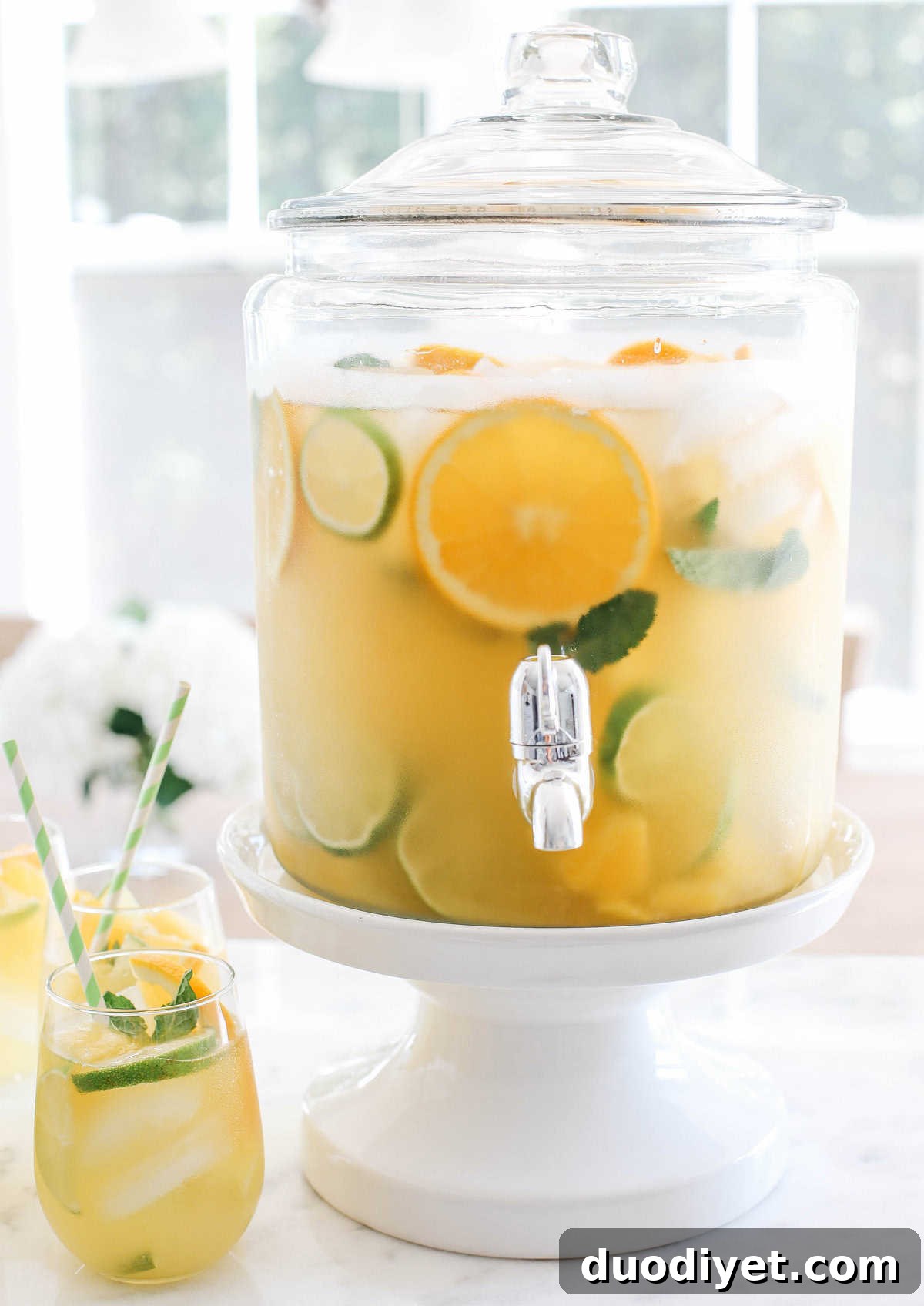 Sparkling Citrus Summer Sangria with White Wine 2 This Citrus Sangria combines fresh pineapple, oranges and limes topped off with sparkling water.