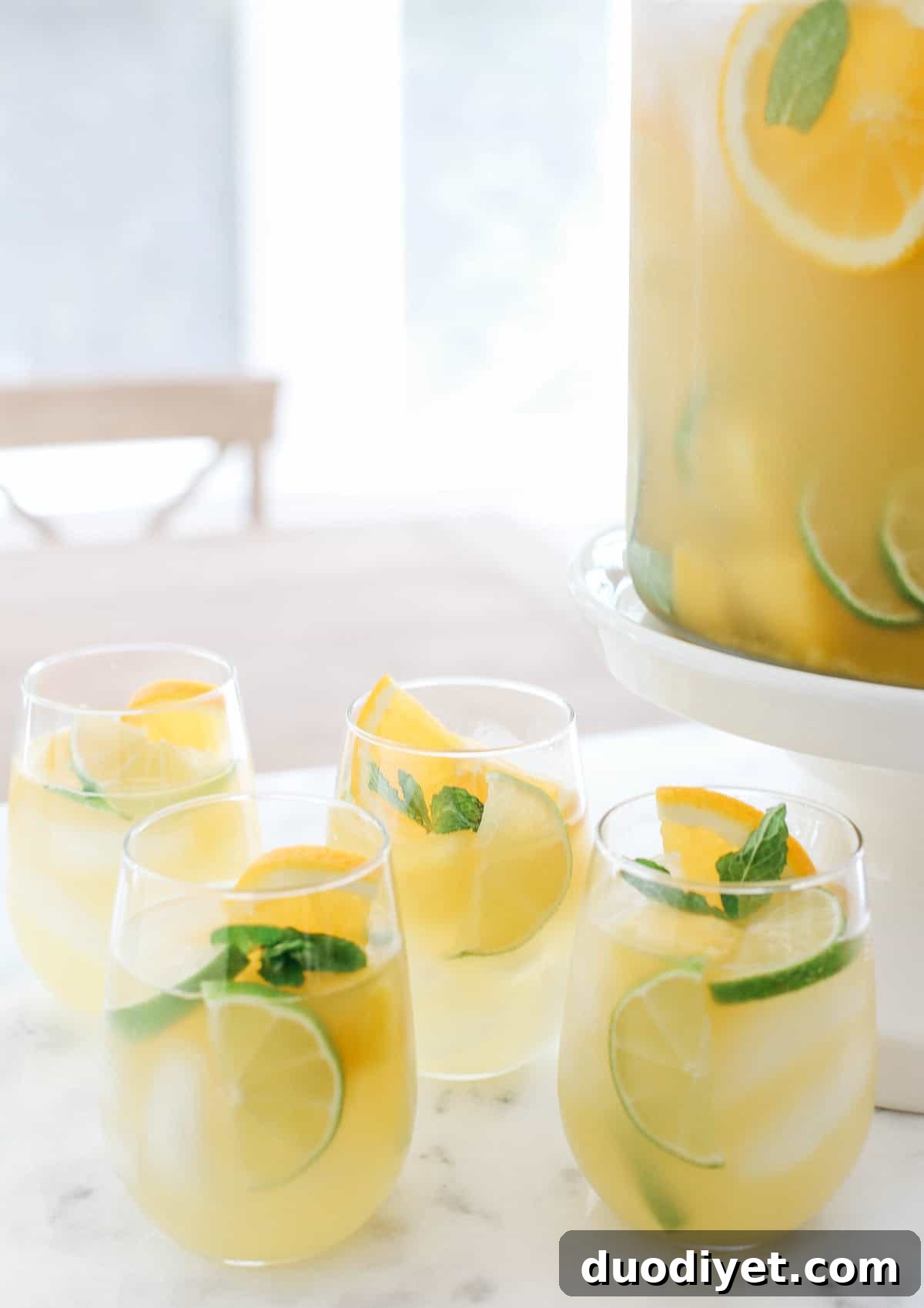 Sparkling Citrus Summer Sangria with White Wine 4 Fresh citrus and pineapple pieces for the sangria.