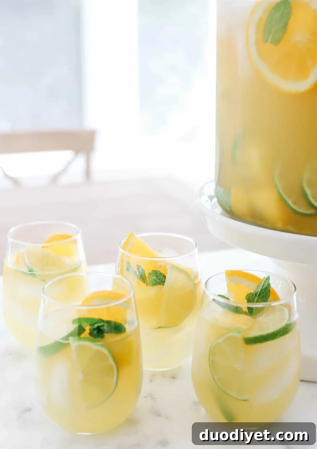 Bright Citrus Sangria Recipe for Summer Gatherings 4 This Citrus Sangria combines all your favorite flavors of summer in one refreshing cocktail with a delicious mixture of fresh pineapple, oranges and limes all topped off with sparkling water!