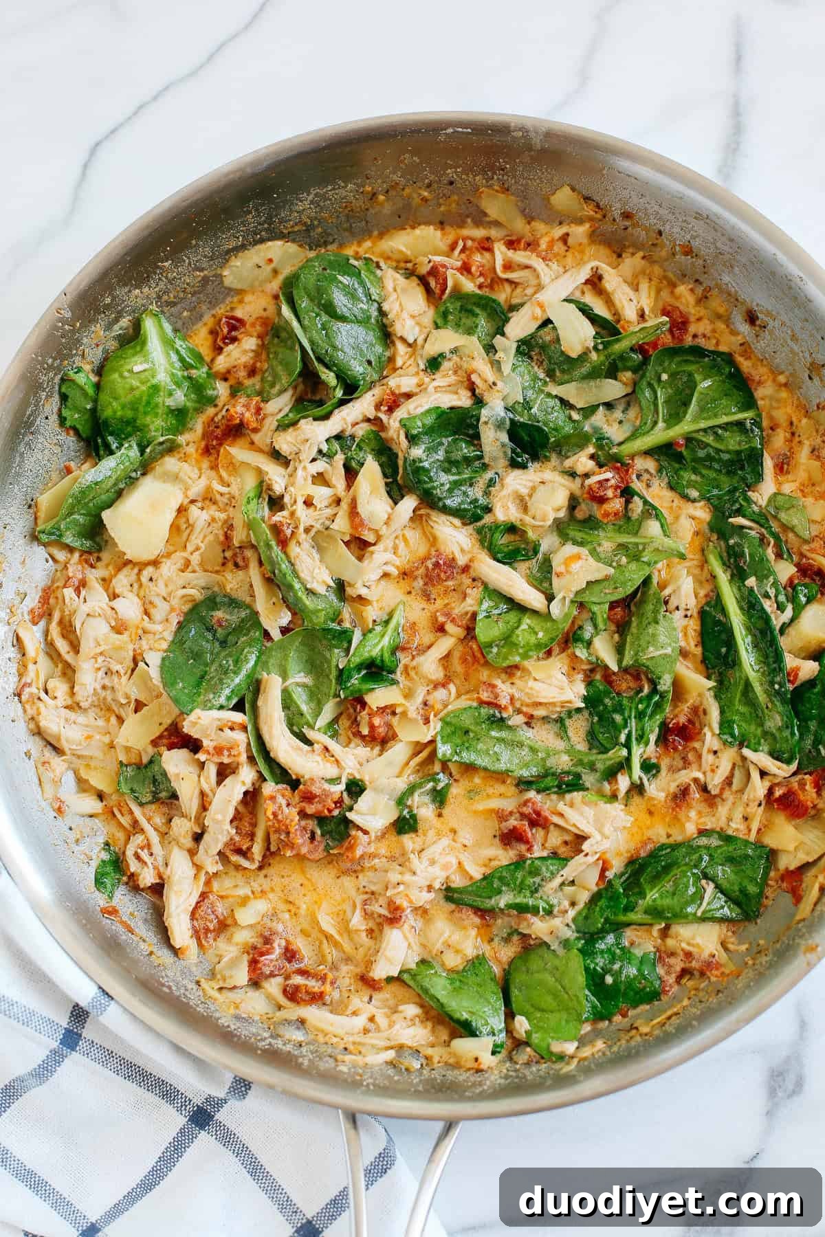 Sun Dried Tomato and Artichoke Spaghetti Squash Boats