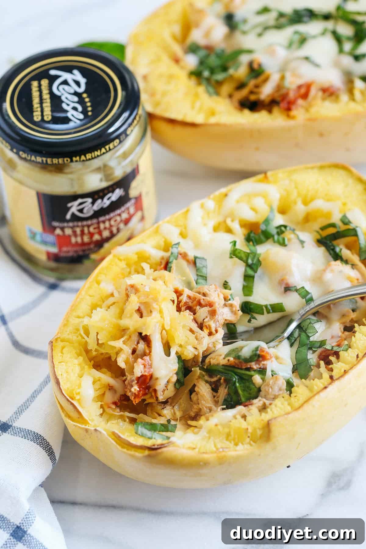 Sun-Dried Tomato Spaghetti Squash Boats Recipe 5 These Sun Dried Tomato and Artichoke Spaghetti Squash Boats are cheesy, delicious and make the perfect weeknight comfort meal that you can enjoy guilt-free!