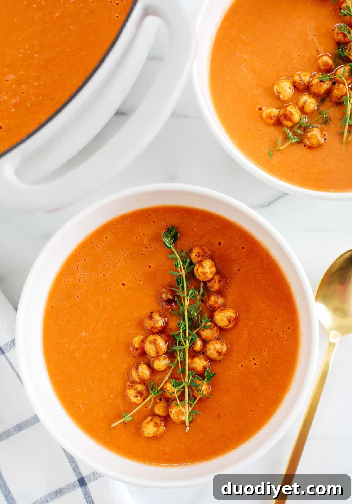 This Creamy Tomato Hummus Detox Soup is the perfect remedy for cold and flu season that is filled with tons of antioxidants and immune-boosting ingredients to keep you healthy all season long!