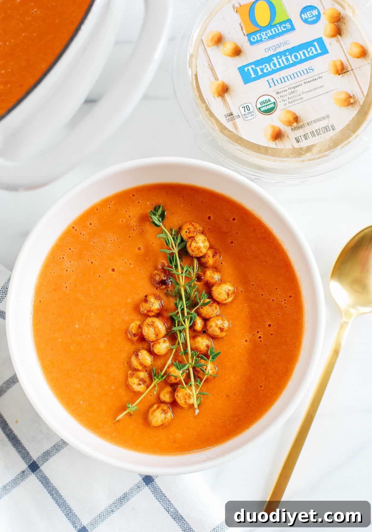 This Creamy Tomato Hummus Detox Soup is the perfect remedy for cold and flu season that is filled with tons of antioxidants and immune-boosting ingredients to keep you healthy all season long!