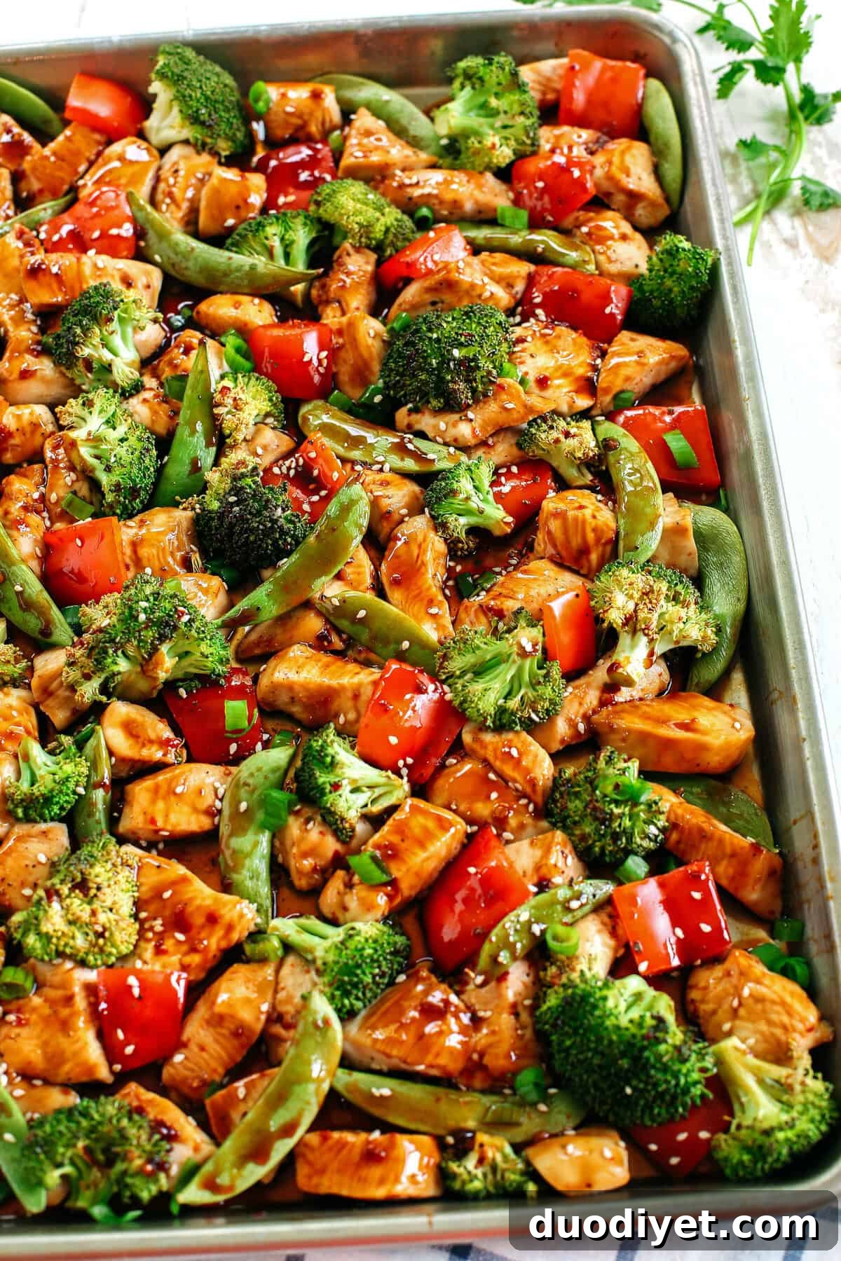 This Sheet Pan Sesame Chicken and Veggies makes the perfect weeknight dinner that’s healthy, delicious and easily made all on one pan in under 30 minutes!  Perfect recipe for your Sunday meal prep too!  