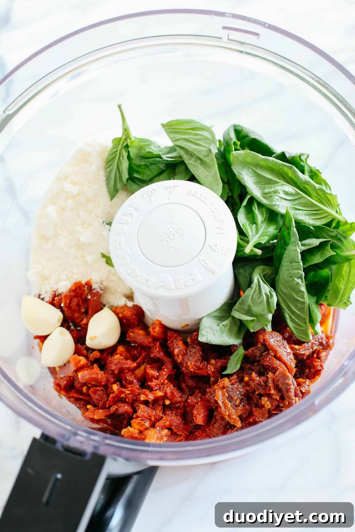 Sun-dried tomato pesto being blended