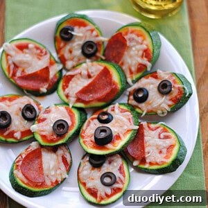 Mini Zucchini Pizza Bites Recipe 4 Finished mini zucchini pizza with melted cheese