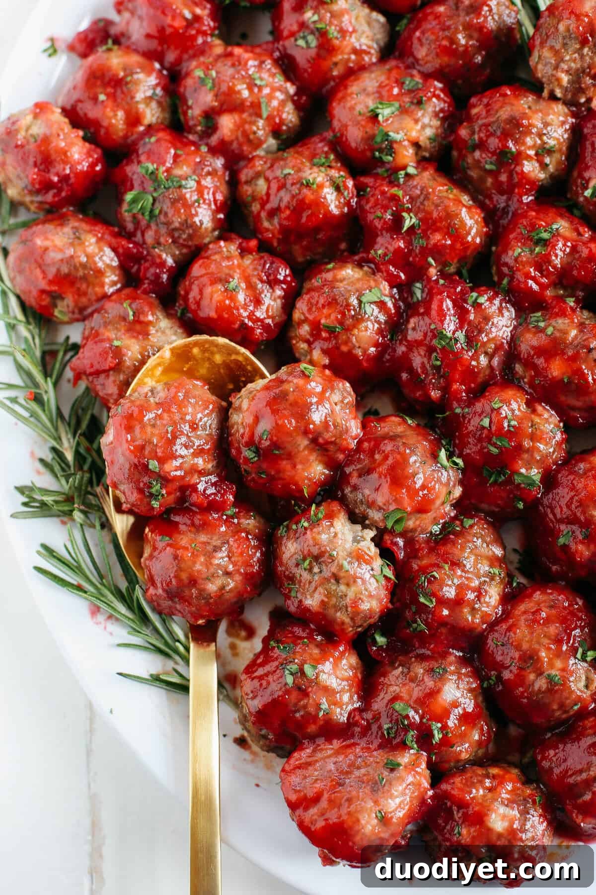 Cranberry Glazed Cocktail Meatballs Recipe 5 These Cranberry Cocktail Meatballs make the perfect holiday appetizer that are easy to throw together with the perfect blend of sweet and savory flavors!