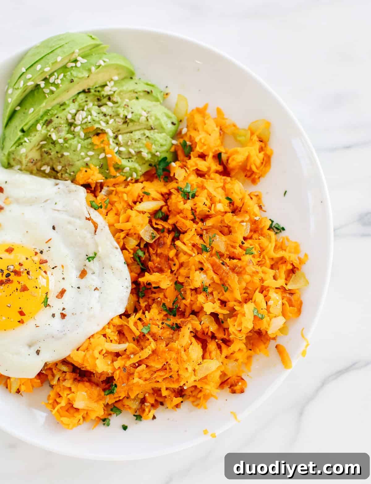 Crispy Sweet Potato Hash Browns Recipe 2 Win at breakfast with these quick and easy Sweet Potato Hashbrowns that are seasoned to perfection with cinnamon and chili powder for a delicious sweet and spicy combo!