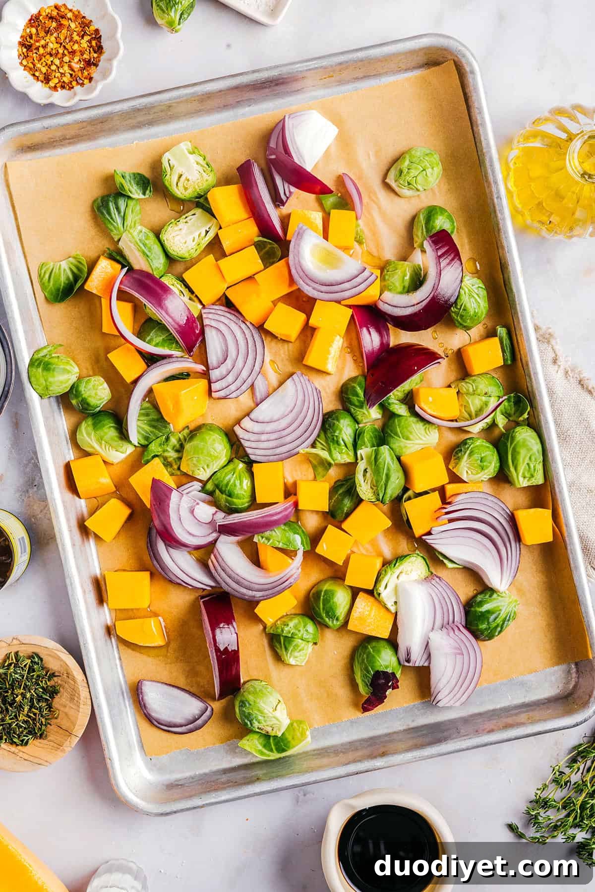 Roasted vegetables under maple glazed chicken