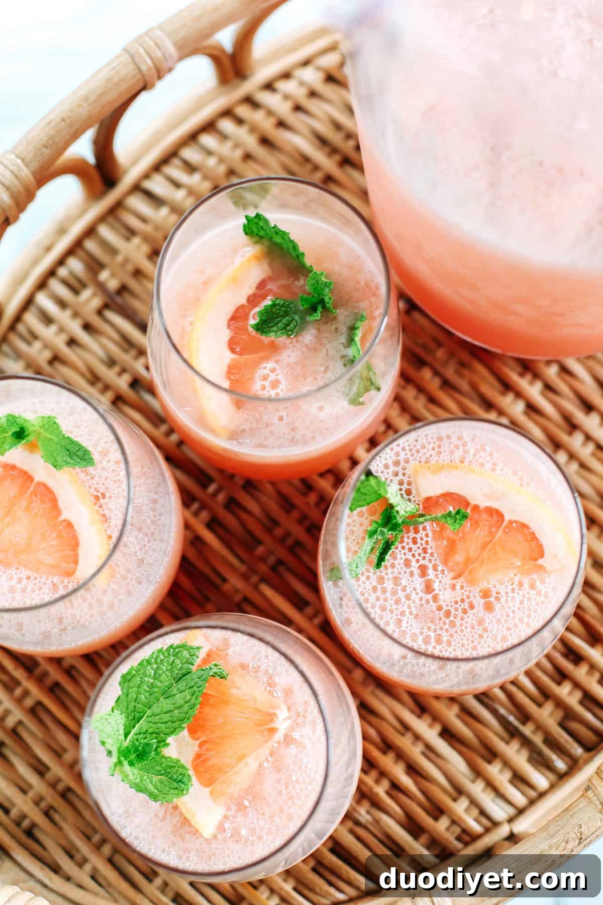 Refreshing Sparkling Grapefruit Frosé that is all natural with zero refined sugar, your favorite bottle of rosé and makes the perfect summer cocktail!