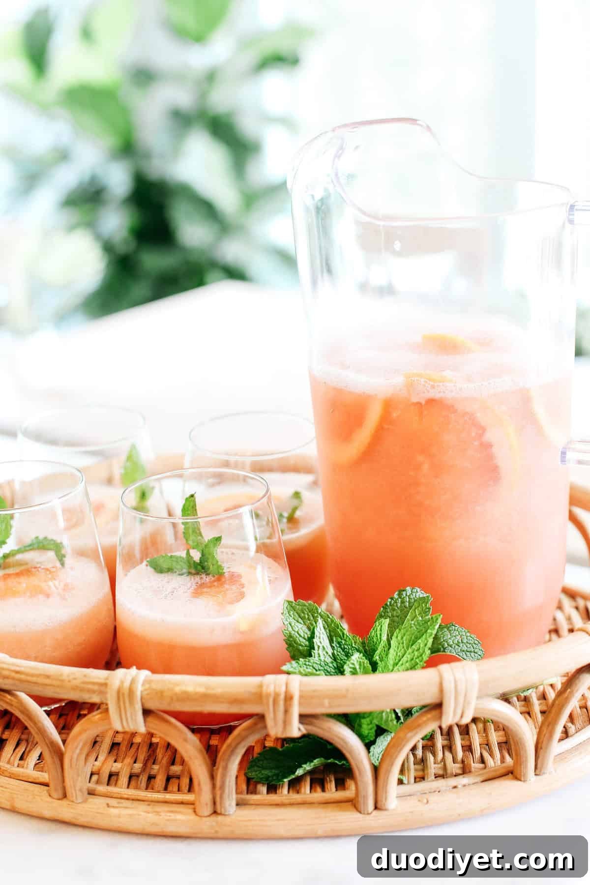 Refreshing Sparkling Grapefruit Frosé that is all natural with zero refined sugar, your favorite bottle of rosé and makes the perfect summer cocktail!