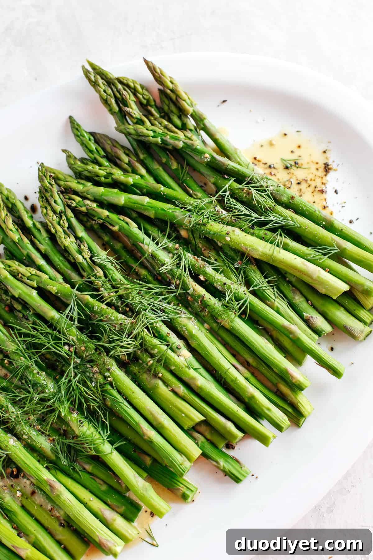 Baked Asparagus with Tangy Mustard-Dill Sauce 2 Baked Asparagus with delicious Mustard Dill Sauce makes the perfect healthy side dish for any meal with just a few simple ingredients!