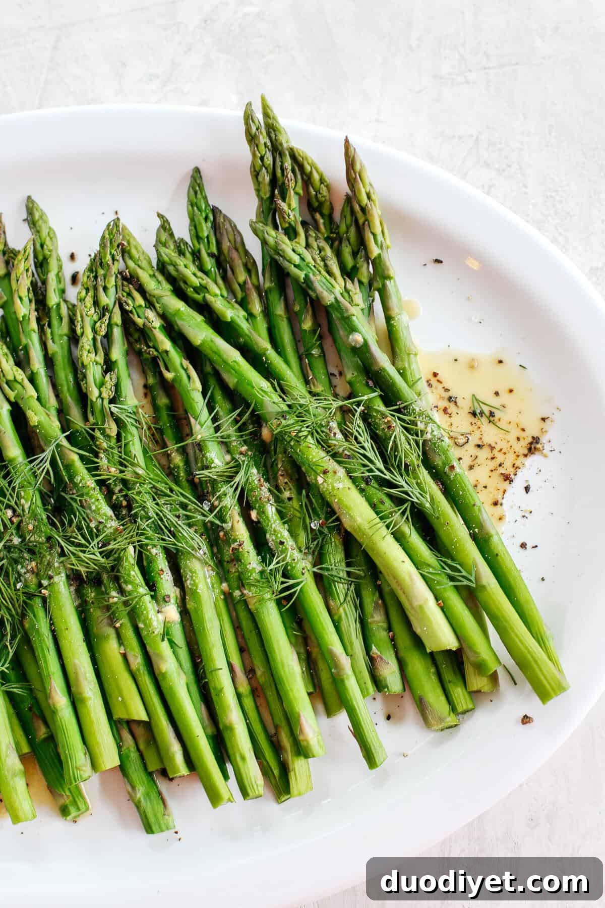 Baked Asparagus with Tangy Mustard-Dill Sauce 4 Baked Asparagus with delicious Mustard Dill Sauce makes the perfect healthy side dish for any meal with just a few simple ingredients!