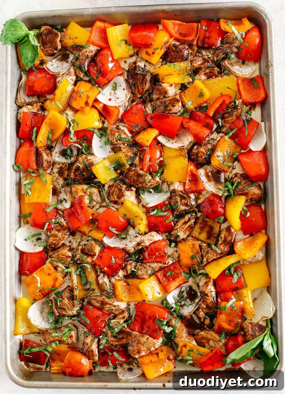 Honey Balsamic Sheet-Pan Chicken with Roasted Veggies 3 Sheet Pan Honey Balsamic Chicken and Veggies - prepped on a baking sheet