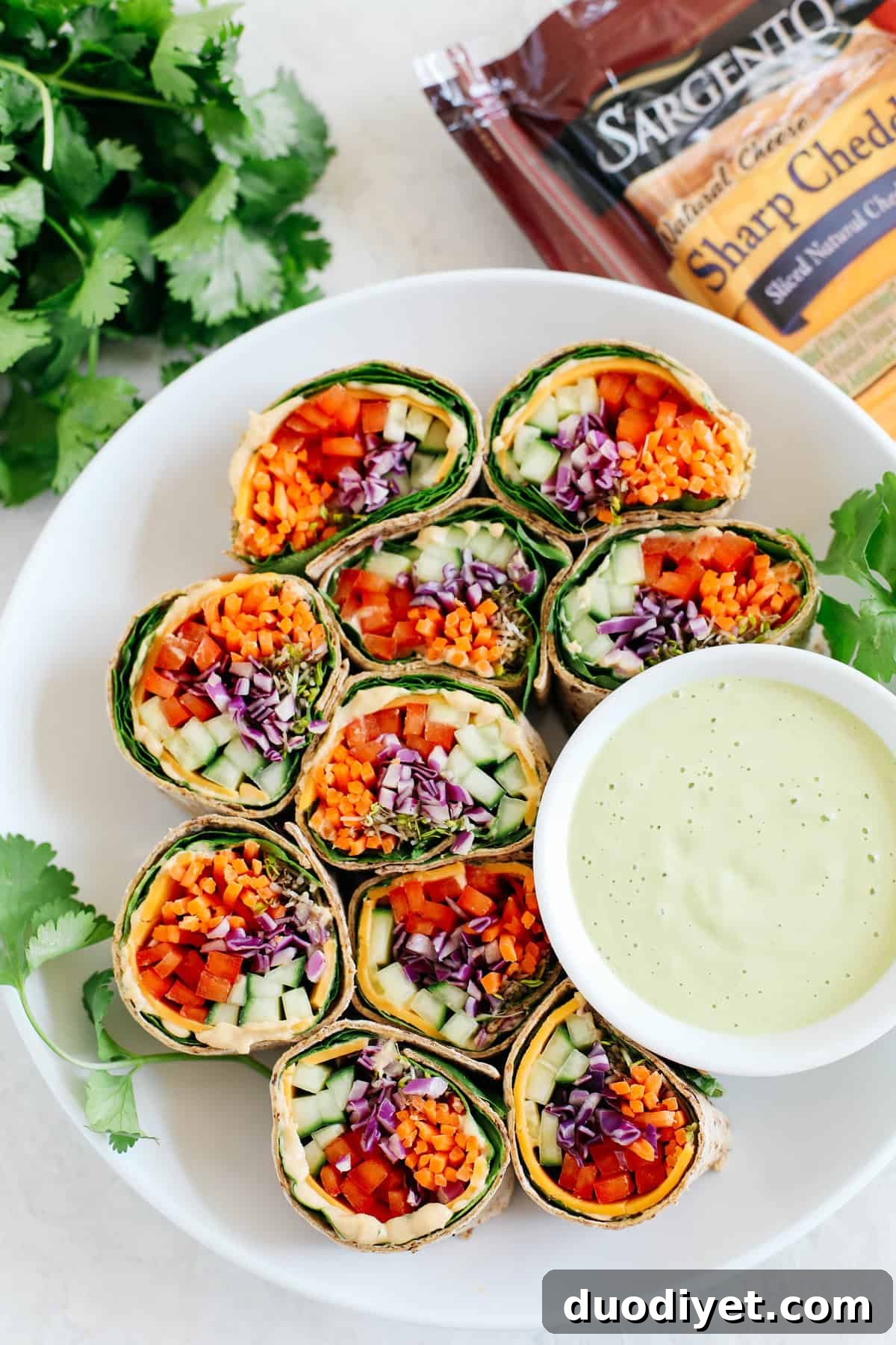 Rainbow Vegetable Rolls with Ginger Avocado Dressing 3 These colorful Rainbow Veggie Rolls are healthy, crunchy and loaded with tons of fresh veggies along with a delicious Ginger Avocado Dressing for dipping or drizzling!
