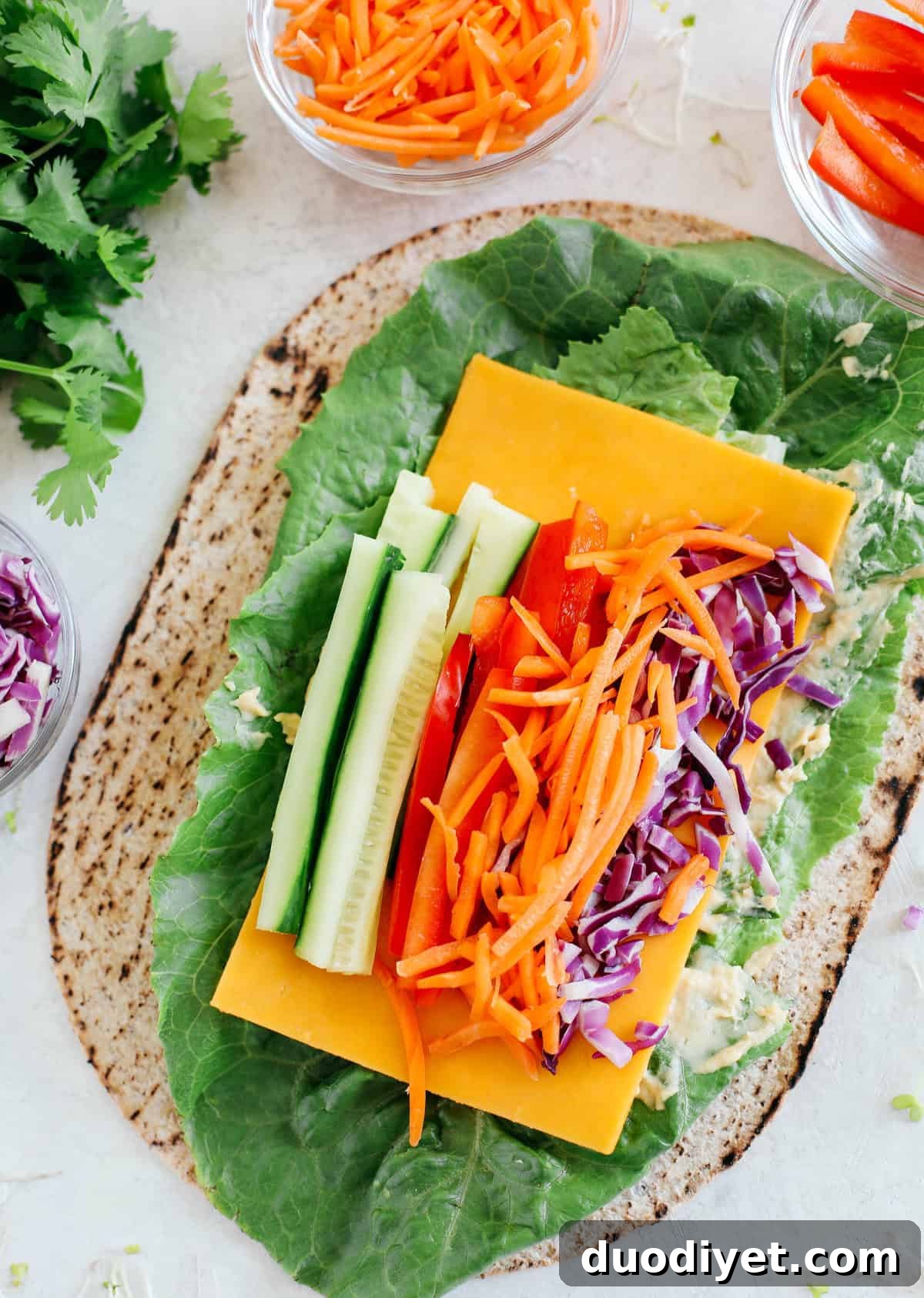 These colorful Rainbow Veggie Rolls are healthy, crunchy and loaded with tons of fresh veggies along with a delicious Ginger Avocado Dressing for dipping or drizzling!
