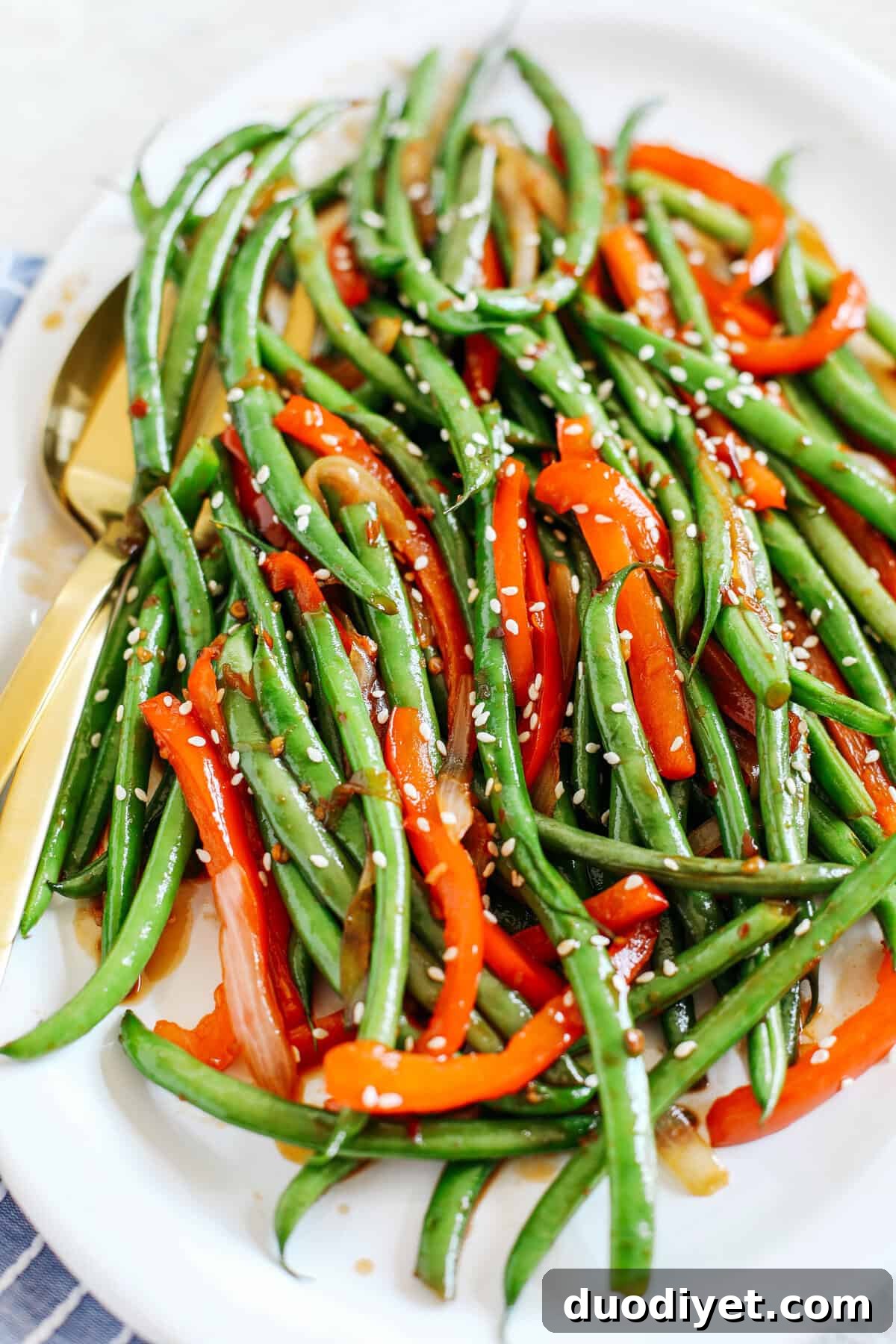 Ginger Soy Glazed Green Beans and Bell Peppers Stir Fry Recipe 4 Bright green beans and red bell pepper finished with sesame seeds