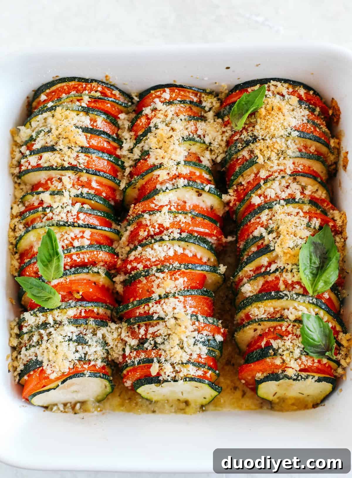 Summer Zucchini and Tomato Gratin with cheesy, crunchy herb topping