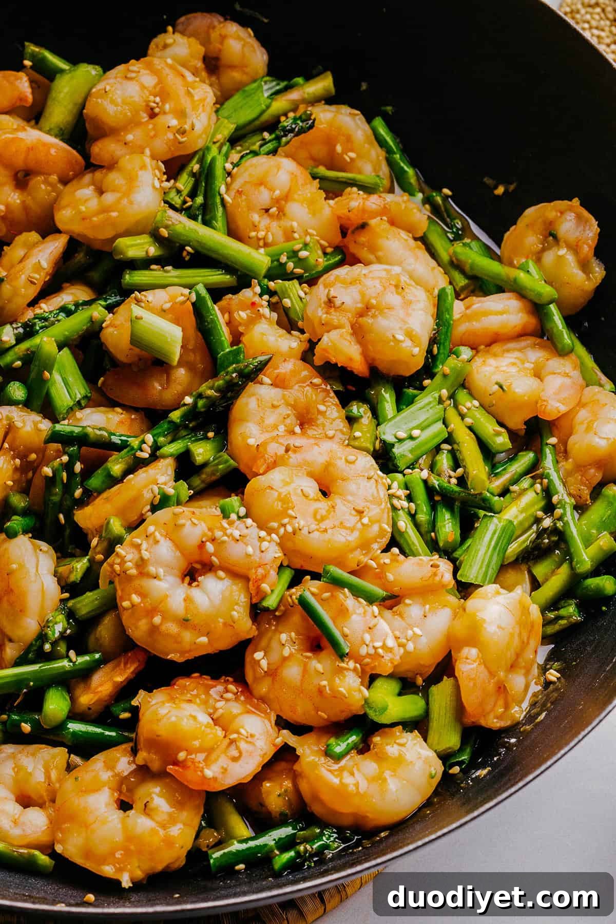 This EASY 20-minute Honey Garlic Shrimp Stir Fry makes a delicious quick weeknight meal that is healthy, flavorful and easily made all in one pan!