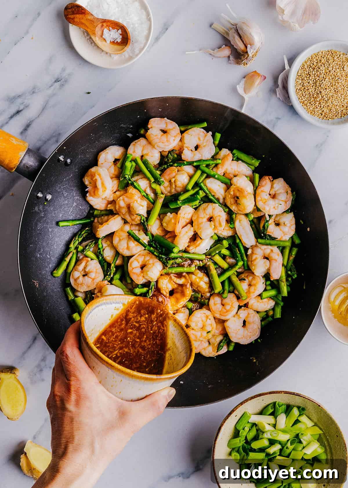 This EASY 20-minute Honey Garlic Shrimp Stir Fry makes a delicious quick weeknight meal that is healthy, flavorful and easily made all in one pan!