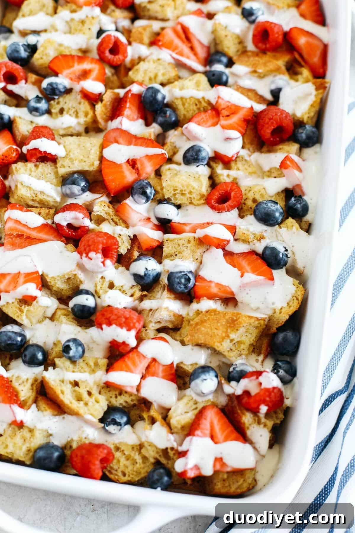 Mixed Berry French Toast Casserole Recipe 5 Warm and flavorful Mixed Berry French Toast Casserole with a delicious cream cheese drizzle that can easily be made the night before for the perfect morning breakfast!