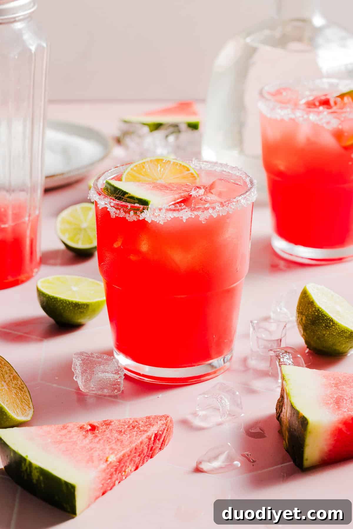 Frozen watermelon margarita cubes and glasses