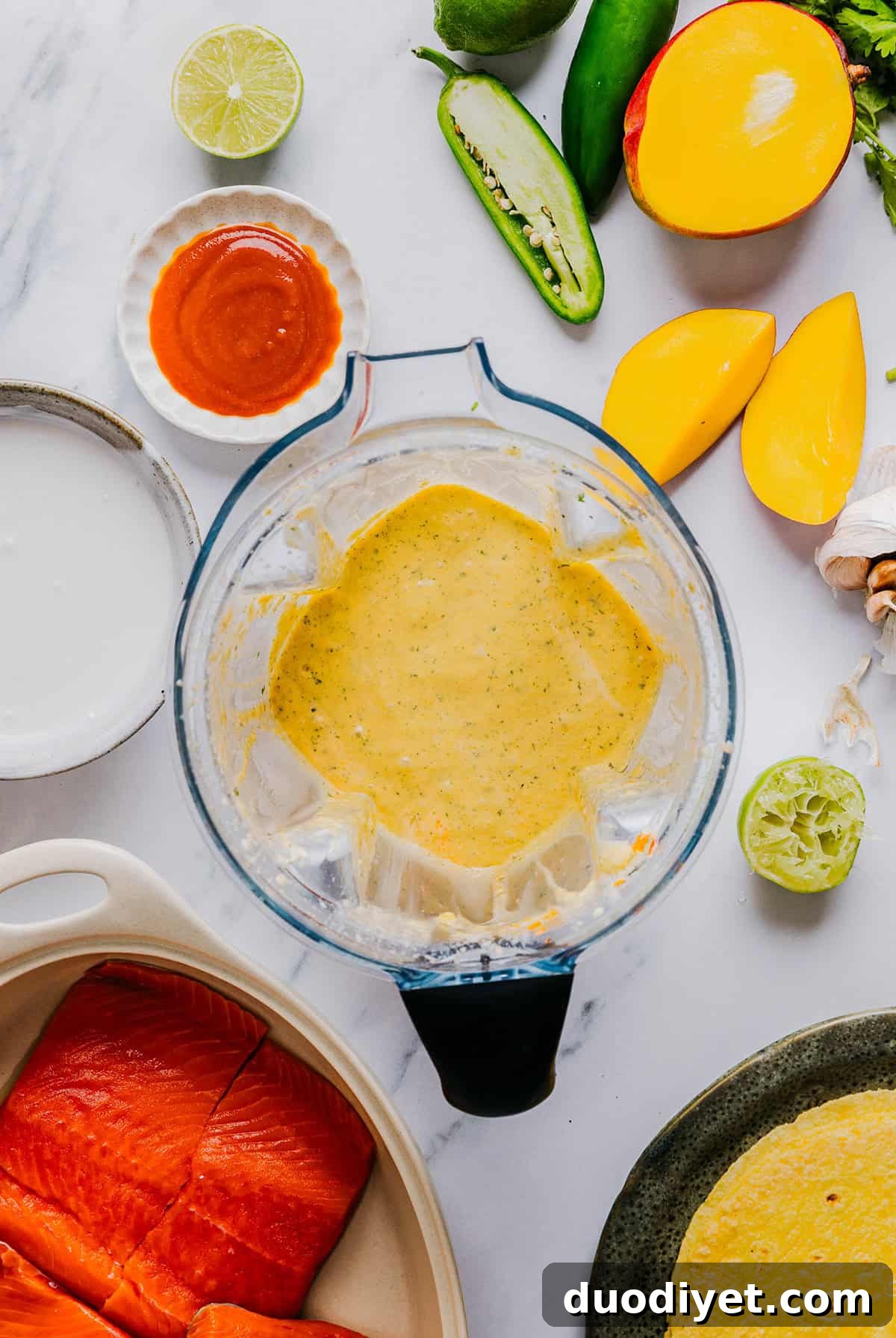 Tacos assembled with mango salsa