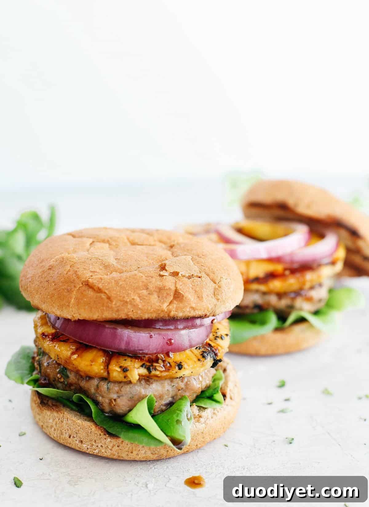 Hawaiian Turkey Burgers with Grilled Pineapple and Teriyaki 3 These delicious Hawaiian Turkey Burgers are packed with tons of flavor, made with a healthy homemade teriyaki sauce and topped with fresh grilled pineapple!