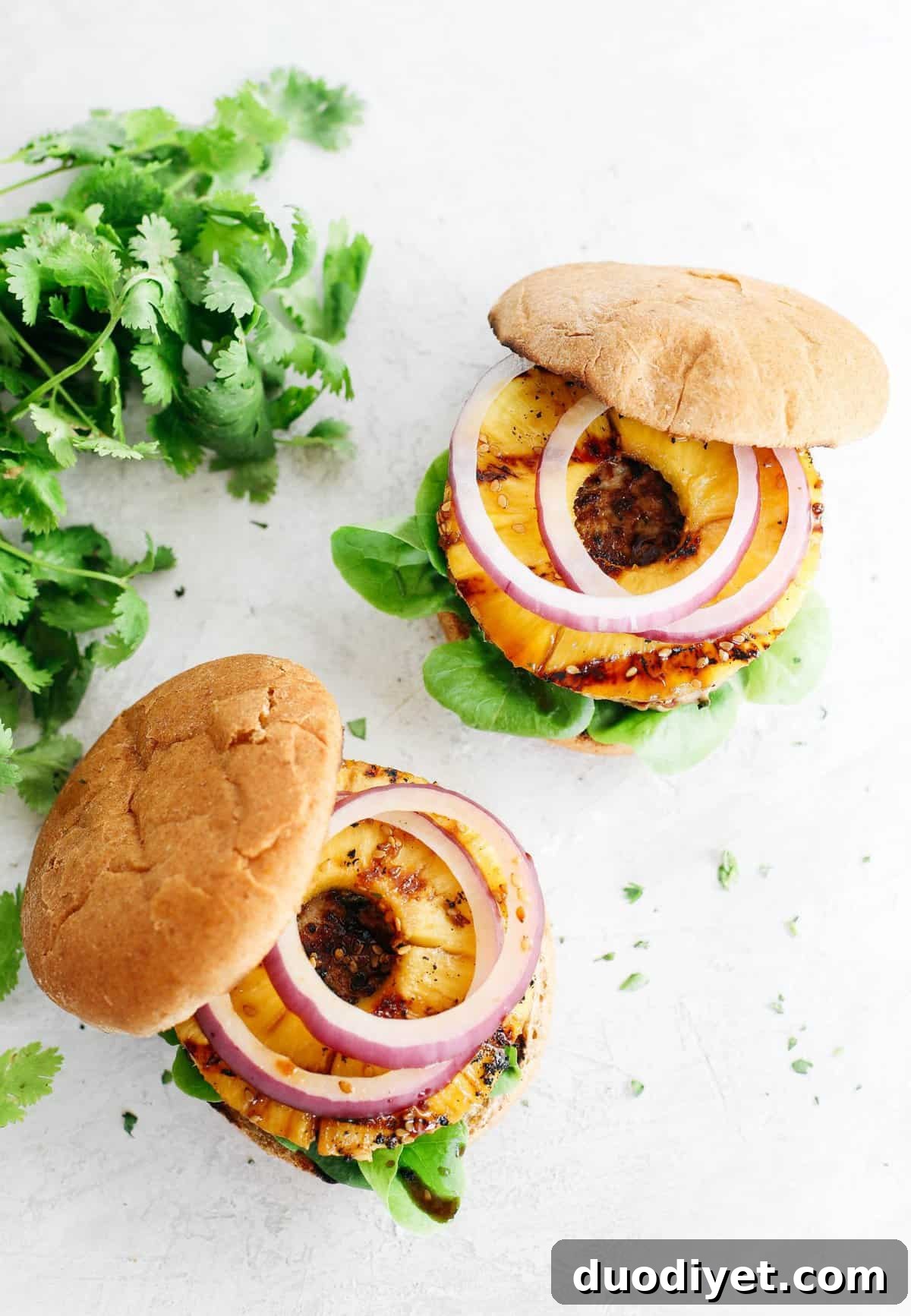 These delicious Hawaiian Turkey Burgers are packed with tons of flavor, made with a healthy homemade teriyaki sauce and topped with fresh grilled pineapple!