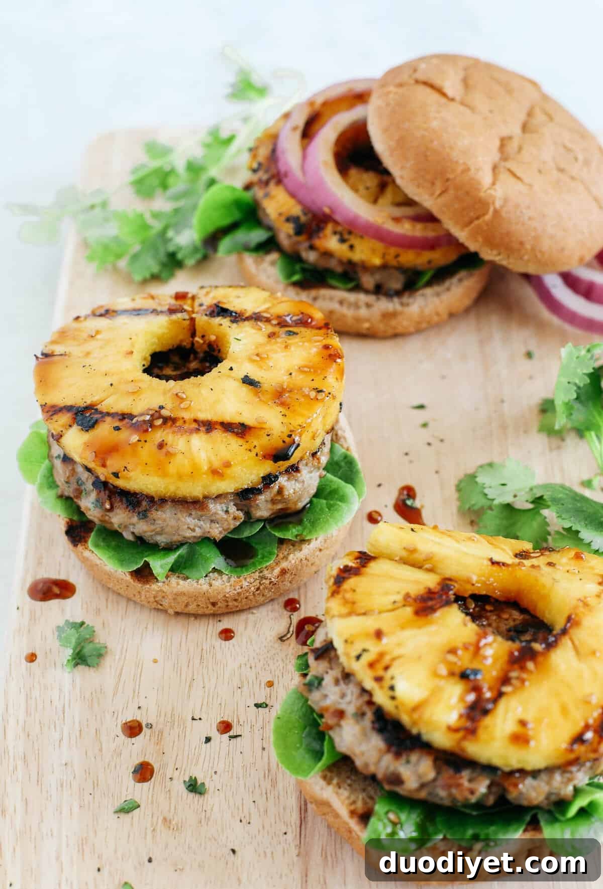 Hawaiian Turkey Burgers with Grilled Pineapple and Teriyaki 5 These delicious Hawaiian Turkey Burgers are packed with tons of flavor, made with a healthy homemade teriyaki sauce and topped with fresh grilled pineapple!