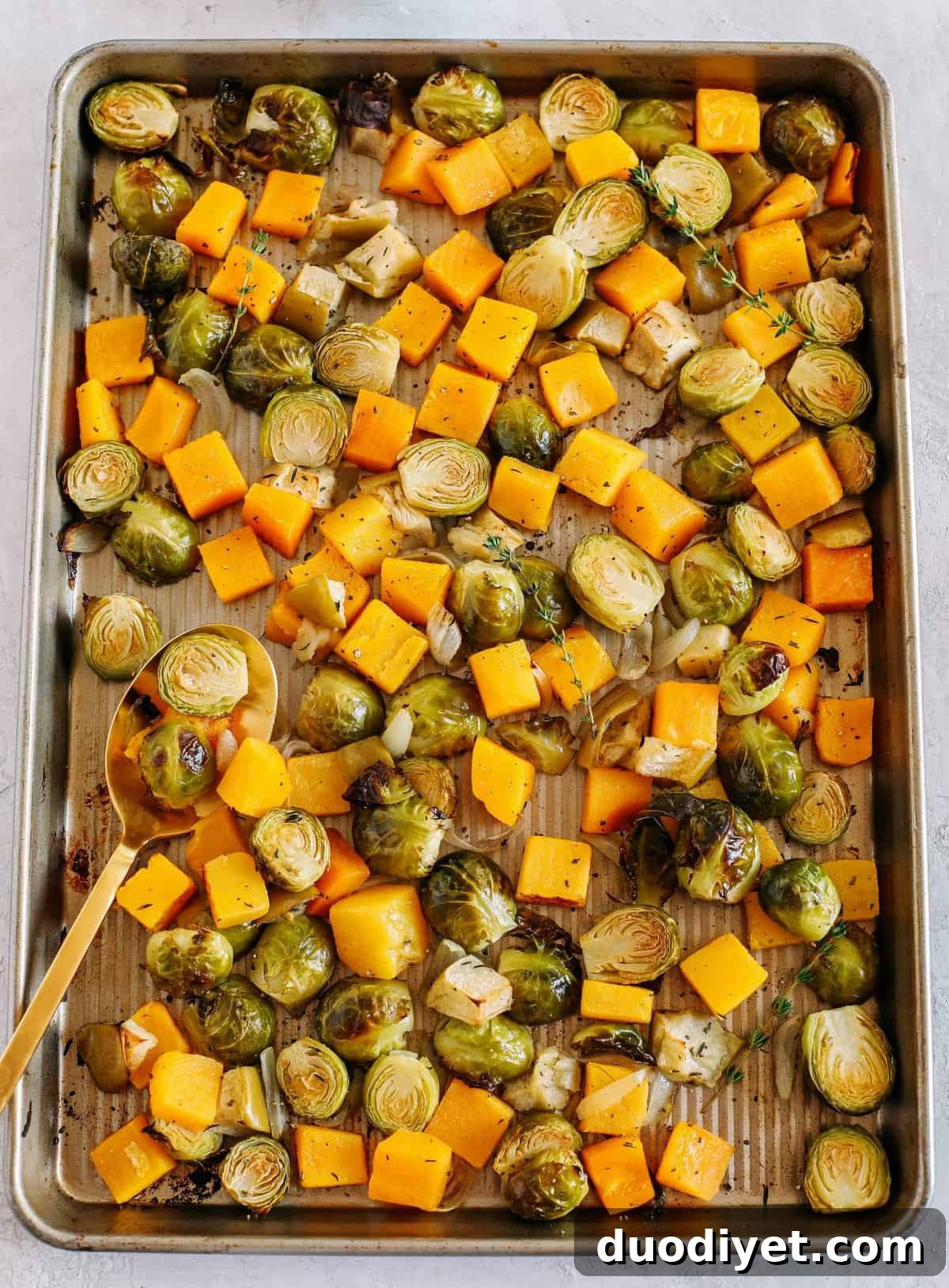 Roasted Maple-Glazed Butternut Squash and Brussels Sprouts 3 Roasted butternut squash, brussels sprouts and apples all tossed together with fresh herbs, chopped pecans and drizzled with a delicious maple dijon glaze! The perfect side dish to your holiday meal!